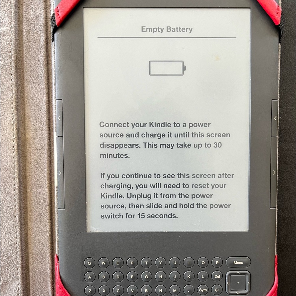 Amazon Kindle with Red and Black Protective Cover
